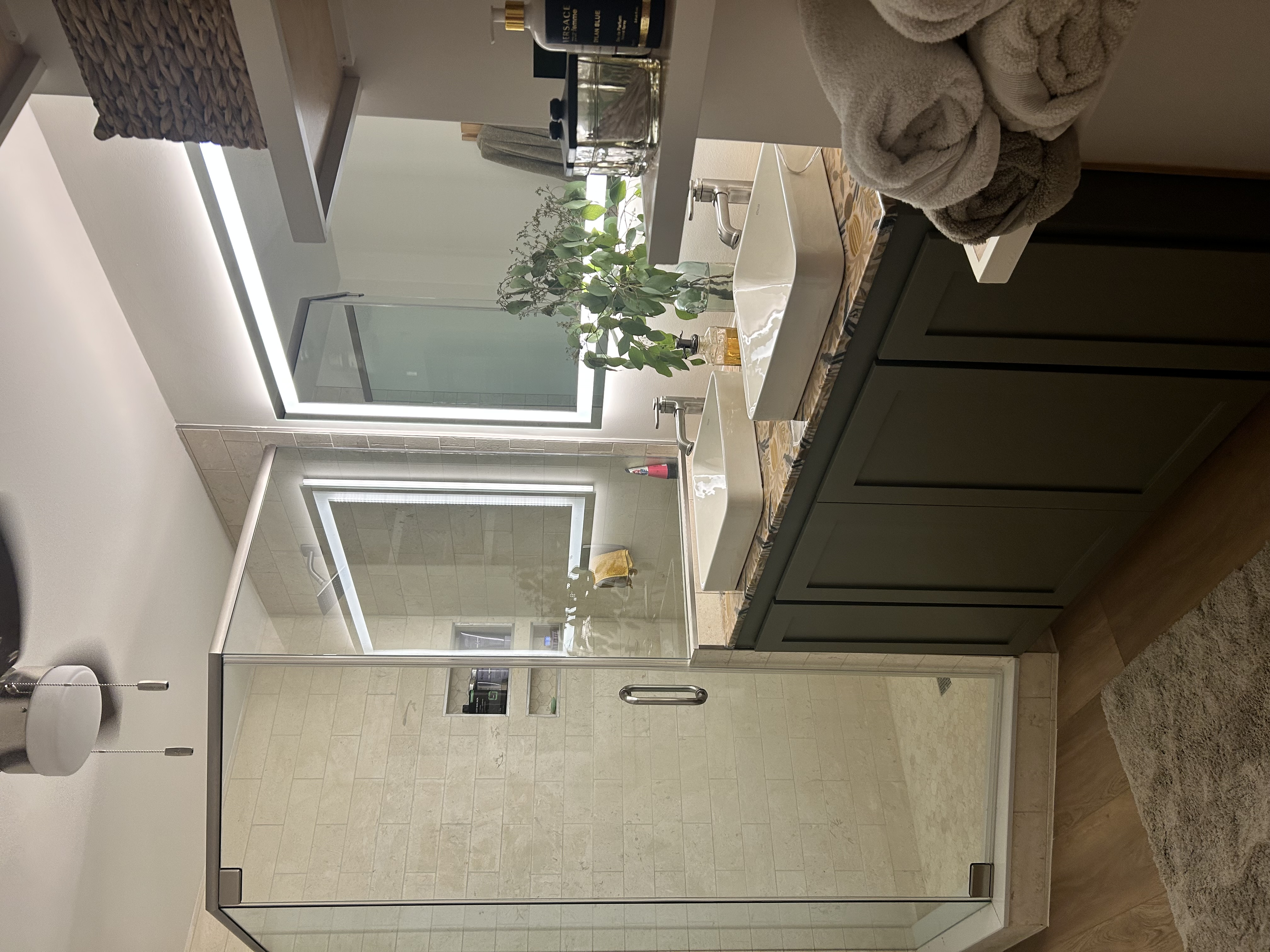 Custom built bathroom vanity with double sinks and modern design